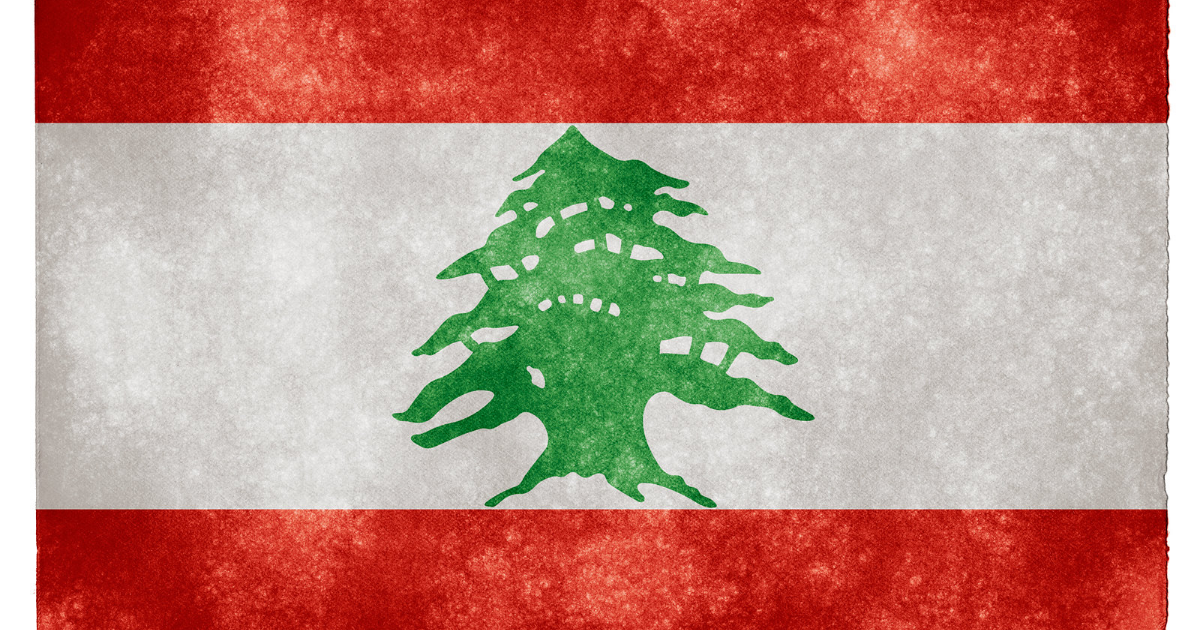 The flag of Lebanon by Header Image: Nicholas Raymond