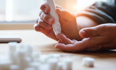 Diabetes patient doing a finger prick test