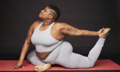 A woman performs a yoga move