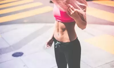 Athlete with abdominal muscles on show