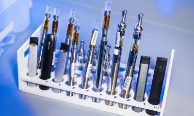 An assortment of vape devices and oils