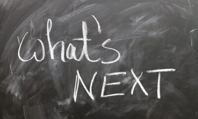 The words What's Next on a blackboard