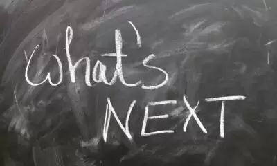 The words What's Next on a blackboard