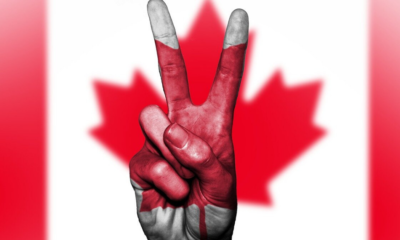 Canadian flag with peace sign