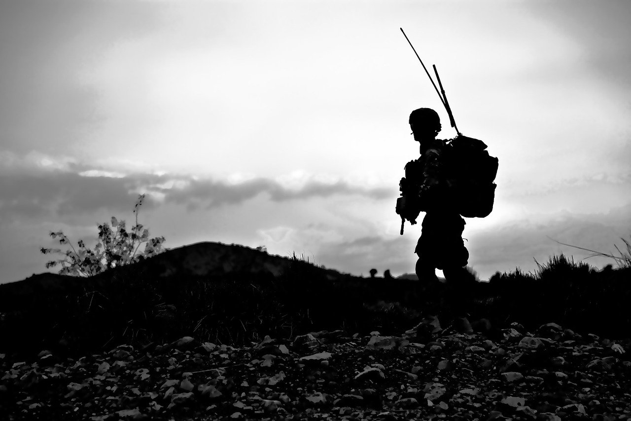 A soldier on a black and white background