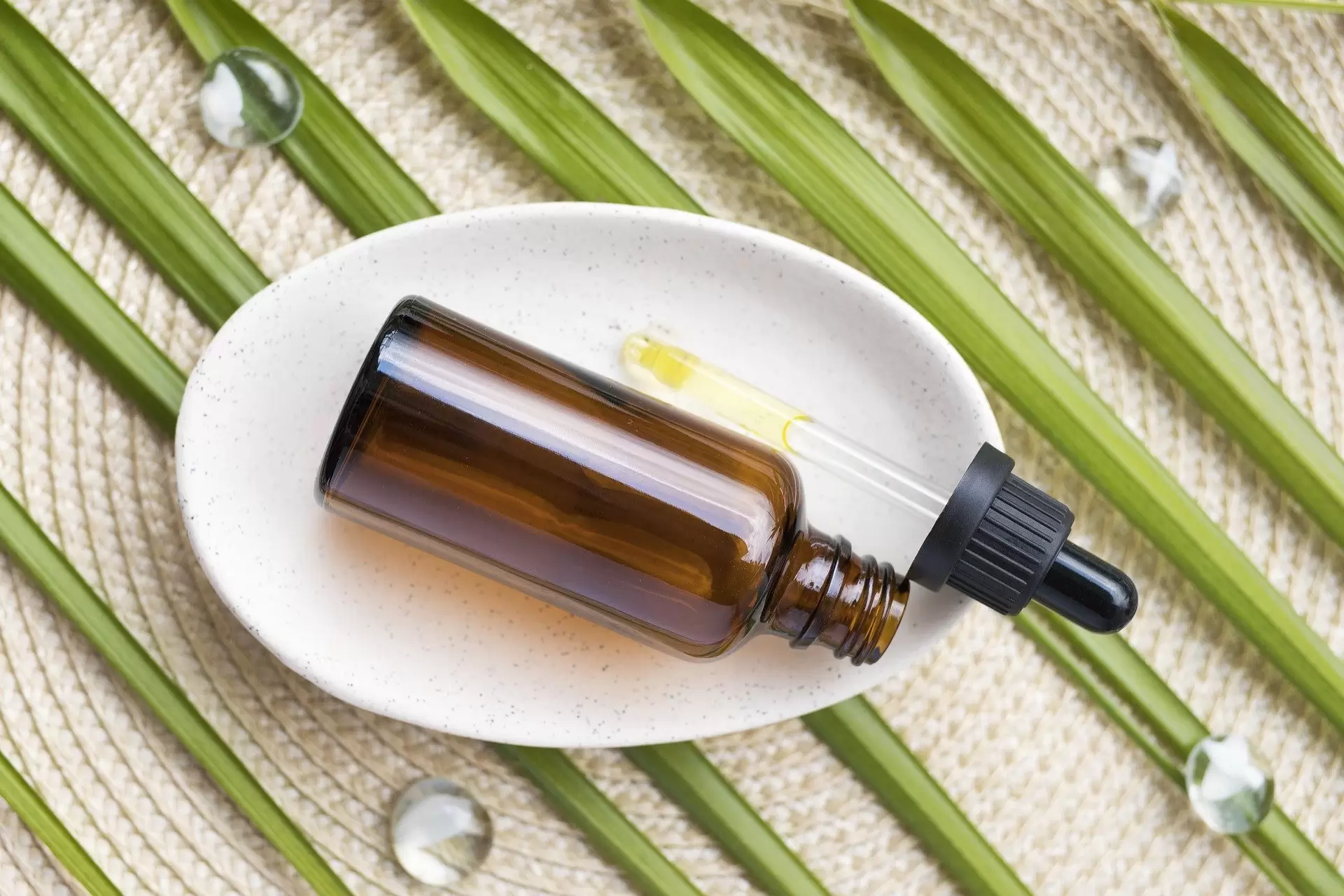 CBD bottle on a grass background