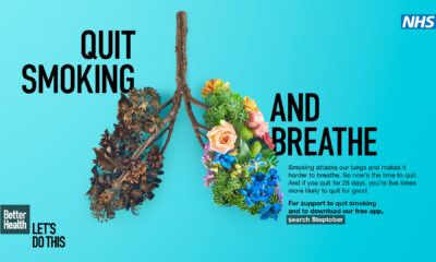 Blue background poster showing human lungs as part of NHS stop smoking campaign