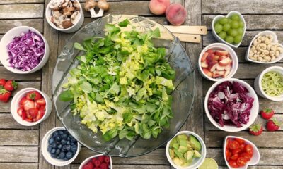 Healthy salad, vegetables on a wooden table