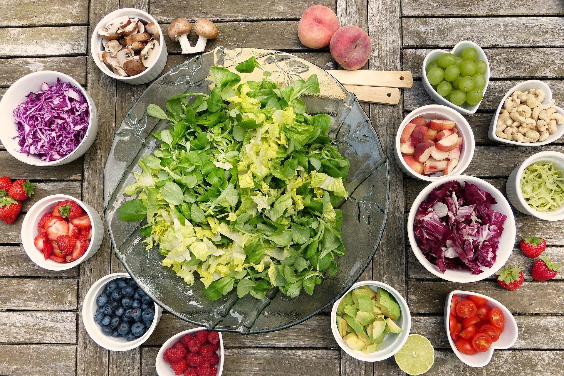 Healthy salad, vegetables on a wooden table