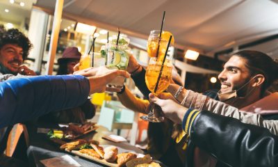 Drinking in a bar wearing masks