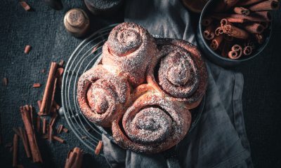 Cinnamon rolls on a plate, ready to be served.