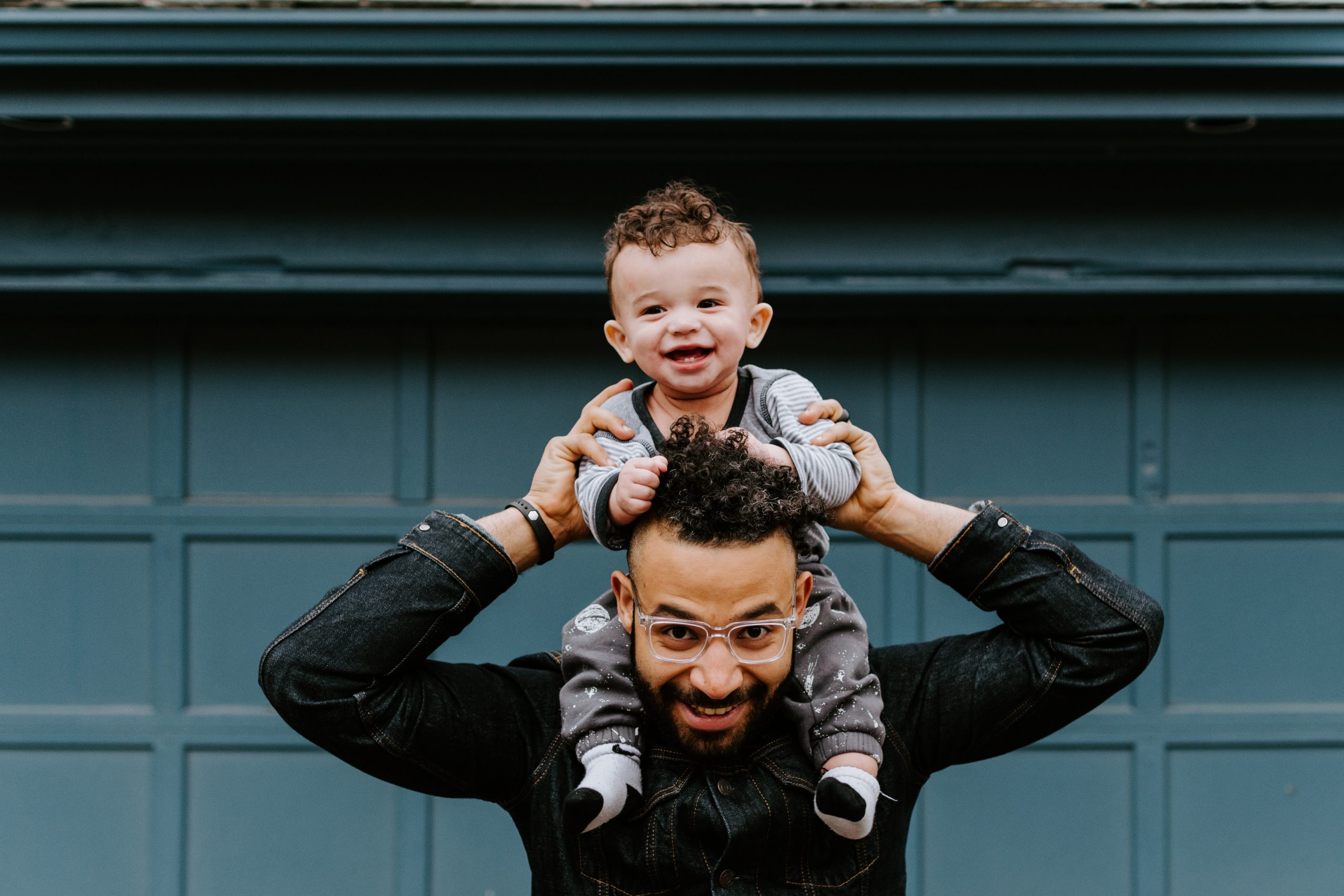 Man with child on shoulders