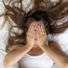 young woman getting some rest in bed.