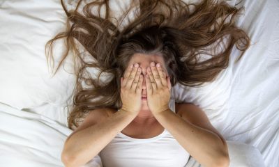 young woman getting some rest in bed.