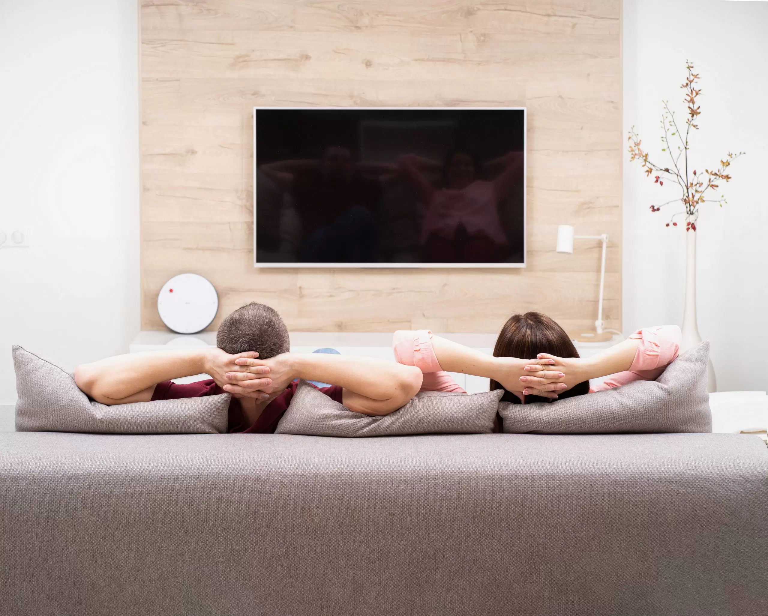 Couple watching tv docuseries "How to Change your Mind".