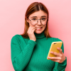 A young lady suffering with phone anxiety.